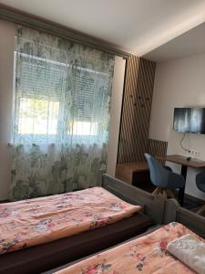 Voodi või voodid majutusasutuse Privatzimmer Jarosch toas