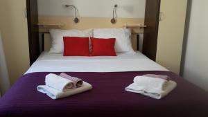 Postel nebo postele na pokoji v ubytování Apartments Sanja