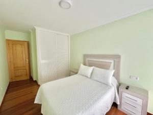 Postel nebo postele na pokoji v ubytování Apartamento Bellavista