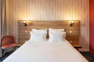 Postel nebo postele na pokoji v ubytování Best Western Hotel Fontaine Argent