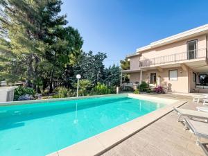 Bazén v ubytovaní Holiday Home Villa Jose - PGI212 by Interhome alebo v jeho blízkosti