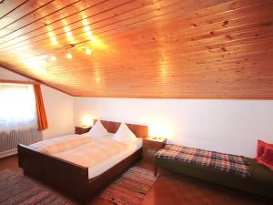 Posteľ alebo postele v izbe v ubytovaní Apartment Jägerhof-2 by Interhome