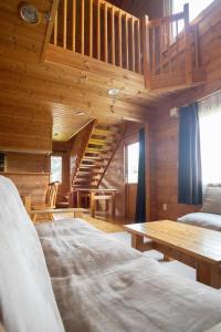 Postel nebo postele na pokoji v ubytování パウダー小屋