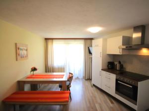 A kitchen or kitchenette at Apartment Jägerhof-3 by Interhome