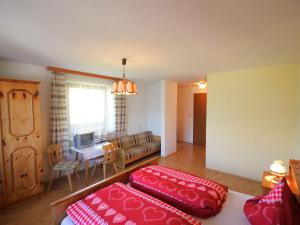A bed or beds in a room at Apartment Jägerhof-3 by Interhome