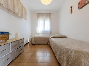 Ένα ή περισσότερα κρεβάτια σε δωμάτιο στο Apartment Tabor-2 by Interhome