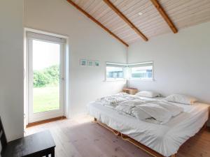 Postel nebo postele na pokoji v ubytování Holiday Home Preben - 500m from the sea by Interhome