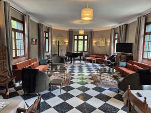 Posezení v ubytování Hôtel Val Du Tech