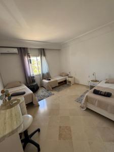 Postel nebo postele na pokoji v ubytování Seaside Luxury Apartment