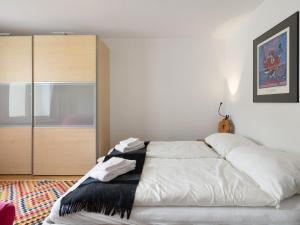 Ένα ή περισσότερα κρεβάτια σε δωμάτιο στο Apartment Seewiese Apt- 204 by Interhome