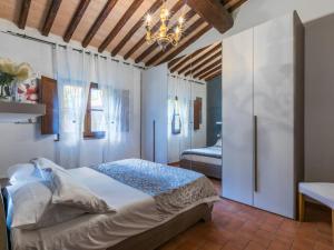 Postel nebo postele na pokoji v ubytování Holiday Home Caggiolo by Interhome