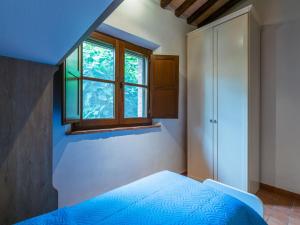 Postel nebo postele na pokoji v ubytování Holiday Home Caggiolo by Interhome