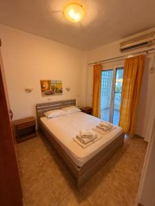 A bed or beds in a room at Hotel Giorgio