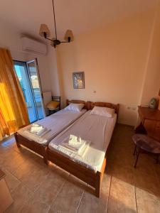 A bed or beds in a room at Hotel Giorgio