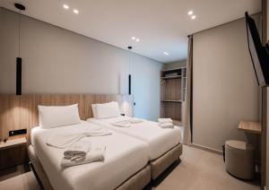 Postel nebo postele na pokoji v ubytování Hotel Portanova