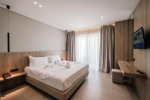 Postel nebo postele na pokoji v ubytování Hotel Portanova