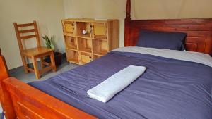 Postel nebo postele na pokoji v ubytování Eco Cribs