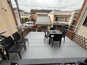 Balkón nebo terasa v ubytování 京都缘屋九条店kyoto-Enishiya guesthouse kujo NEW OPEN 新开业免费西式早餐