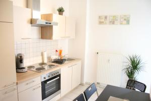 Køkken eller tekøkken på Citywohnungen Halle Saale