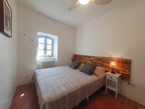 Postel nebo postele na pokoji v ubytování Maison Grand Rue - Vue Exceptionnelle sur le Luberon