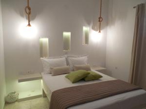 Postel nebo postele na pokoji v ubytování Niki Rooms