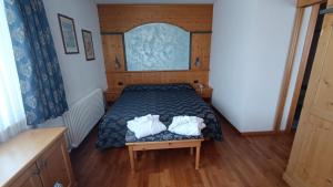 Postel nebo postele na pokoji v ubytování Hotel Corona