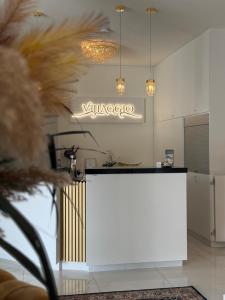 Kuchyň nebo kuchyňský kout v ubytování Villaggio Hotel