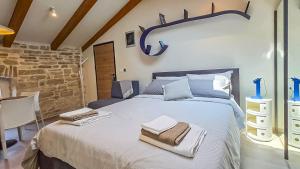 En eller flere senge i et værelse på Studio Bale 2402