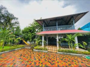 Κήπος έξω από το Ganesh Farm House