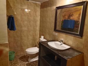 Ένα μπάνιο στο Rijal Bungalow
