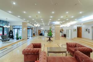 Vstupní hala nebo recepce v ubytování Hotel Rusca