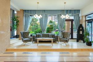 Posezení v ubytování Hotel Rusca + 37 fotografií