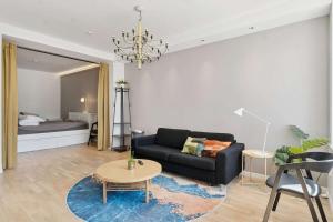 Katil atau katil-katil dalam bilik di Aalborg Apartment Centralt Beliggende med Moderne Faciliteter