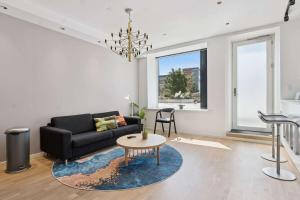 Ruang duduk di Aalborg Apartment Centralt Beliggende med Moderne Faciliteter
