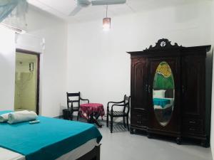 Postel nebo postele na pokoji v ubytování Casa Del Ceylon