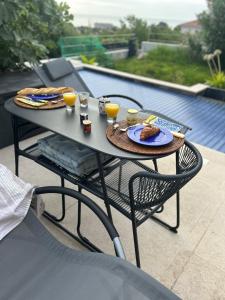 Nápoje v ubytování COTTAGE MARIN avec VUE MER