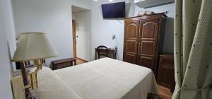 Posteľ alebo postele v izbe v ubytovaní Hotel Chipén