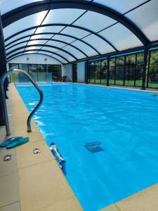 Swimmingpoolen hos eller tæt på Cabane aux étoiles -piscine-golf à 50m