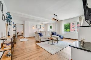 Televisyen dan/atau pusat hiburan di Noble Supreme Suite 80m2 Kamin & Designküche - zentrumsnah Essen