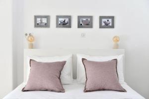 Posteľ alebo postele v izbe v ubytovaní Luxury Paros Villa Villa Ianthe Striking Beauty 4 Bedrooms Glisidia