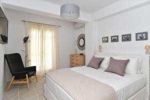 Posteľ alebo postele v izbe v ubytovaní Luxury Paros Villa Villa Ianthe Striking Beauty 4 Bedrooms Glisidia + 27 fotografií