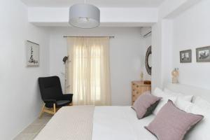 Posteľ alebo postele v izbe v ubytovaní Luxury Paros Villa Villa Ianthe Striking Beauty 4 Bedrooms Glisidia