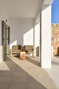 Posedenie v ubytovaní Luxury Paros Villa Villa Ianthe Striking Beauty 4 Bedrooms Glisidia