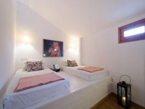 a bedroom with two beds and a window at Deluxe Rhodes Villa Villa Sokaki Well Furnished 2 Bedrooms Lindos in Líndos