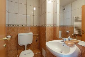 Koupelna v ubytování Hotel Rusca