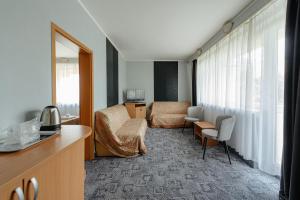 Posezení v ubytování Hotel Rusca