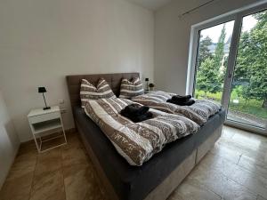 Postel nebo postele na pokoji v ubytování Ferienwohnungen Ebenzweier