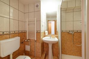 Koupelna v ubytování Hotel Rusca