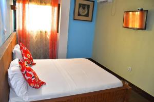 Postel nebo postele na pokoji v ubytování Authentica Hôtel