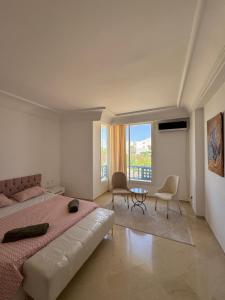 Postel nebo postele na pokoji v ubytování Seaside Luxury Apartment